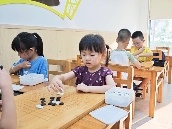3、我們這一周的照片分享又再次回到了我們小棋手們的課堂日常_副本.jpg